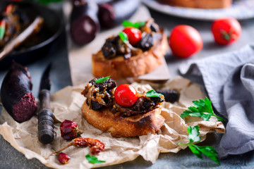 Black pudding with onion crostini.selective focus
