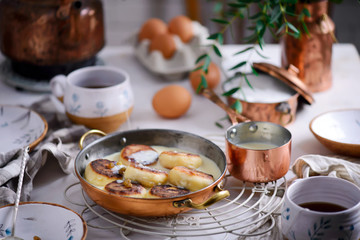 Cottage cheese pancakes with cream sauce..style rustic