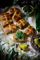 savoury cheddar and wild garlic hot cross buns..traditional easter pastries.