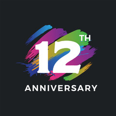 12 years anniversary logo with colorful brushstroke backgrounds
