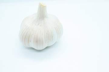 Obraz na płótnie Canvas Garlic head located on a white background