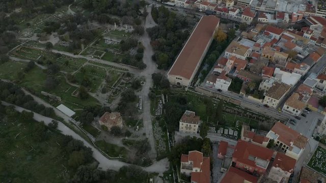 Aerial tilt up shot of the Monasteraki area in Athens and the ruins of the Agora.