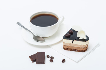 Heart shaped cup of coffee and dessert cake