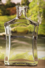 Wedding decoration of two bottle with hearth and love sign on a window.