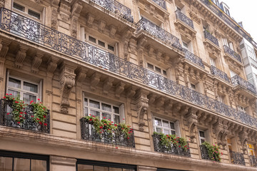 Obraz premium Paris, typical facade and windows, beautiful building in the Marais