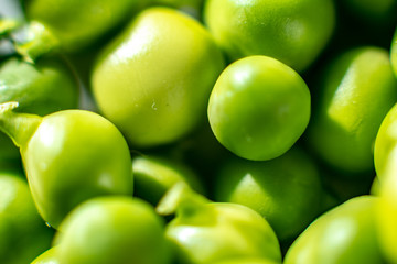 Green fresh peas, close-up texture.