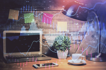 Multi exposure of forex graph and work space with computer. Concept of international online trading.
