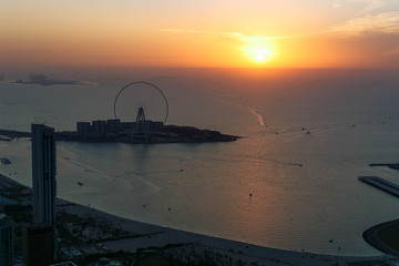 Dramatic sunset over the Bluewaters Island, Dubai, UAE