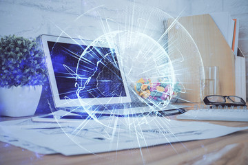 Multi exposure of business theme icons and work space with computer background. Concept of success.