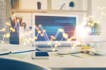 Naklejka premium Stock market graph and table with computer background. Double exposure. Concept of financial analysis.