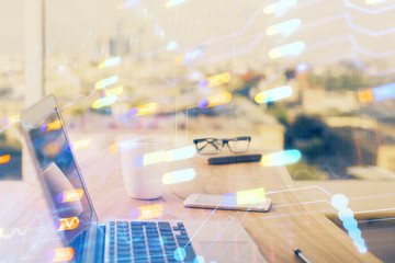 Double exposure of desktop computer and technology theme hologram. Concept of software development.