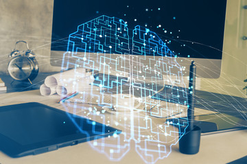 Multi exposure of work space with computer and human brain hologram. Brainstorm concept.