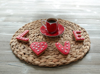 a cup of Turkish coffee and cookies specially prepared for Valentine's Day.