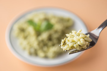 Rice with basil pesto sauce