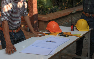 Engineers are meeting to discuss the design of a residential project.concept