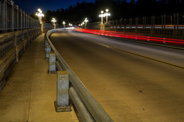 Cars travel over the Colorados Street Bridge in Pasadena, California