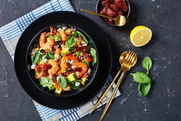 tasty shrimp avocado spinach salad, top view