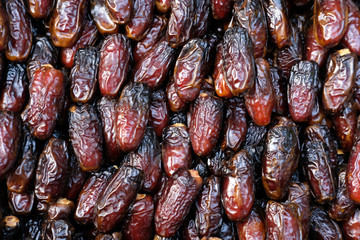 Close up of fresh date fruit for sale.