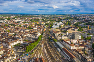 Fototapeta na wymiar Drone view of Dijon city in France under blue sky