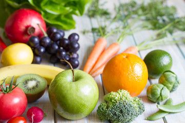 Composition still life fresh fruits and vegetables on wooden board healthy diet lifestyle concept