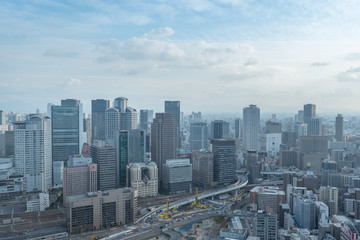 Naklejka na ściany i meble Aerial view of traffic on highway road in Osaka, Japan