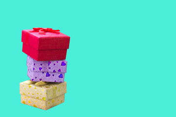 3 gift boxes and turquoise background color