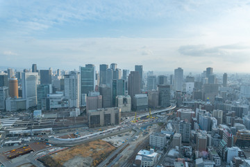 Naklejka na ściany i meble Aerial view of traffic on highway road in Osaka, Japan