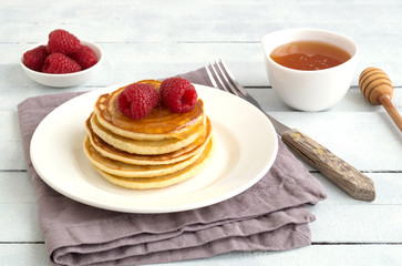 pancakes with honey and raspberries