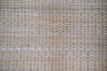 Textured wooden mat background.