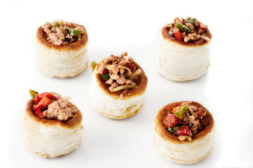 studio shot of volovan filled of pepper and meat