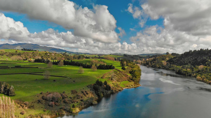 Fototapeta na wymiar New Zealand aerial view. Meadows and river