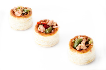 studio shot of volovan filled of pepper and meat