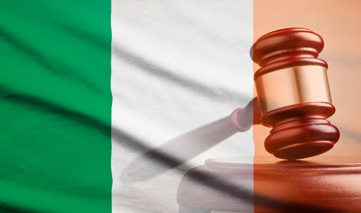 Legal gavel over a flag of the Ireland