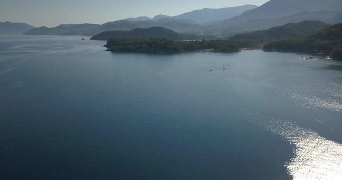Aerial footage of Phaselis ruins on the coast of Turkey, sunny view, 4k