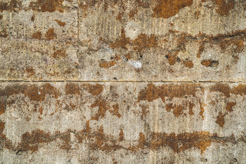 Concrete wall texture background. Grey and brown surface. Horizontal line