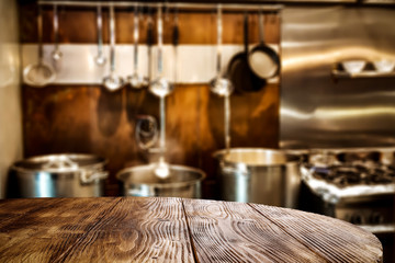 Desk of free space and kitchen interior 