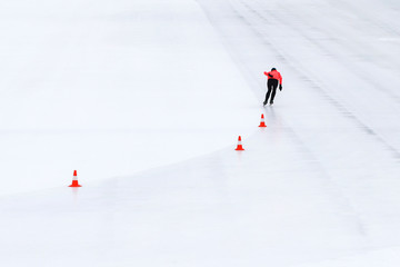 Skater on the ice. Winter sport, speed skating.