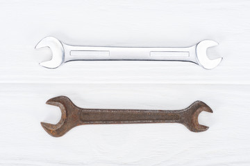 Top view of shiny and rustle on white wooden surface