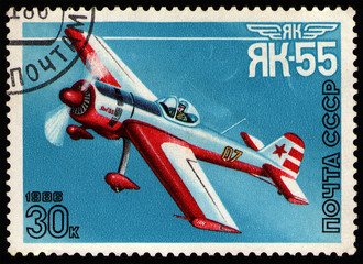 USSR - CIRCA 1986: post stamp 30 Soviet kopek printed by USSR, shows Yakovlev Yak-55, a single-seat...