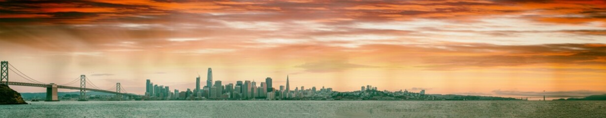 Fototapeta na wymiar Panoramic view of San Francisco skyline from the ocean at sunset