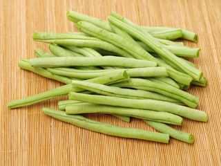 Green kidney bean in hay background