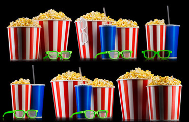 Set of striped buckets with popcorn, cups of drink and glasses isolated on black