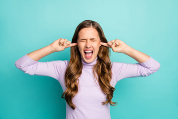 Closeup photo of crazy beautiful stressed lady hiding ears fingers inside avoiding parents fighting...