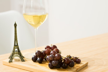 Wine with grape and Eiffel Tower