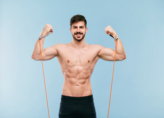 Fitness male posing in studio 
