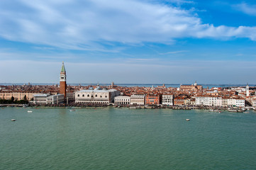Fototapeta na wymiar View from the sea to Venice with the Campanile di San Marco and the Doge's Palace, Italy