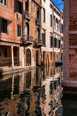 Fototapeta na wymiar characteristic canals, buildings and bridges in Venice, Italy