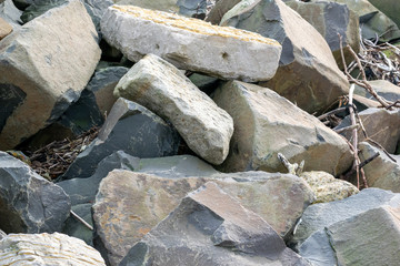 A pile of rocks that are sat along the coastline situated at Roker Beach Sunderland, Tyne and Wear.