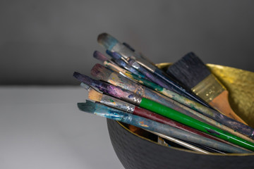 Colorful paint brushes. Art concept. Painting process.