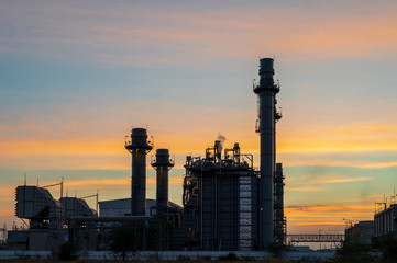 Fototapeta na wymiar power plant at sunset
